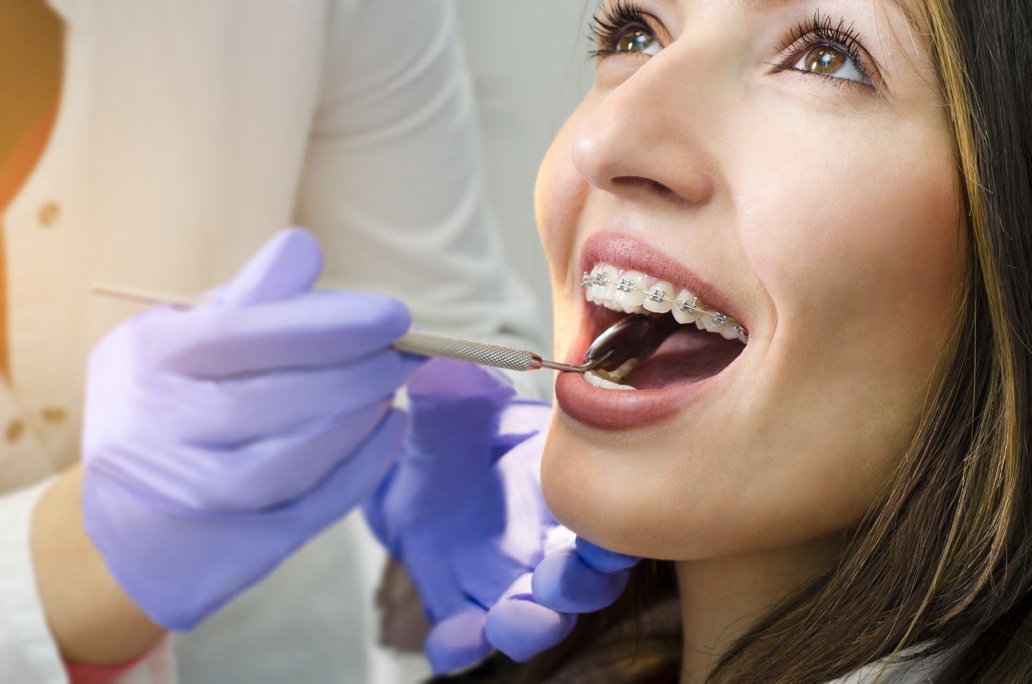 Young woman smiling at her dental appointment